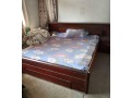 double-sized-bed-with-bed-side-table-attached-small-0